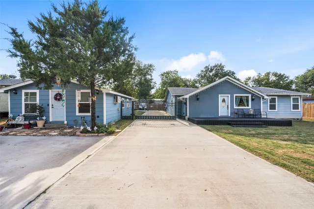 a front view of a house with yard