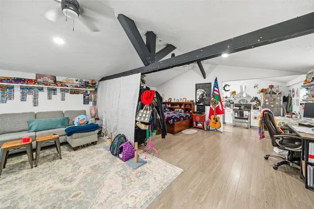 a view of a garage with a bike and storage