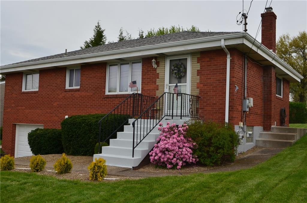 Welcome to 132 Starling Drive, excellently maintained, manicured lawn, professional landscape, concrete walks, driveway with extra parking pad, multipane casement windows,  The beautiful pink azalea welcomes SPRING and is welcoming you!