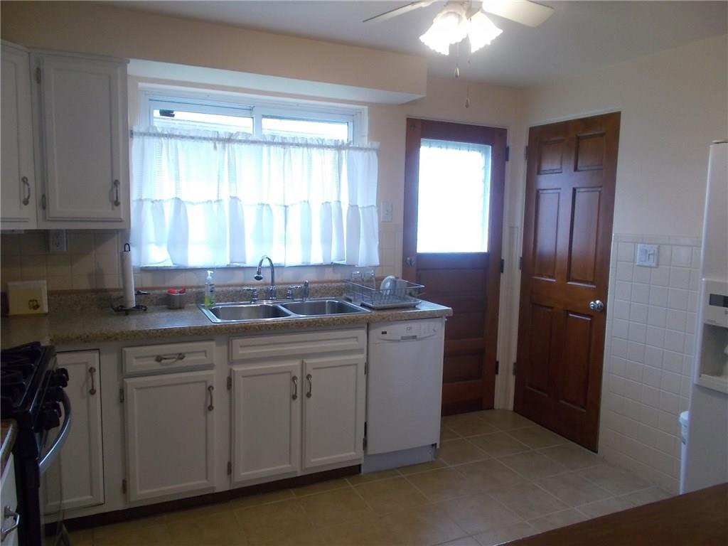 132 Starling Drive McKees Rocks, PA 15136 - Photo 13 of 25 Additional view of the kitchen and side entrance door