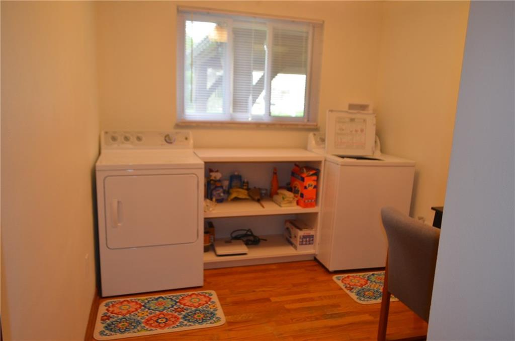132 Starling Drive McKees Rocks, PA 15136 - Photo 16 of 25 Bedroom 3 - Currently used as a first floor laundry area, easily converted back as a bedroom and enough room for a small bed as is. Washer and dryer are included; however are not warranted and being sold "AS IS". In addition, the washer and dryer are not part of the home warranty. Being sold "AS IS", or will remove at buyers request.