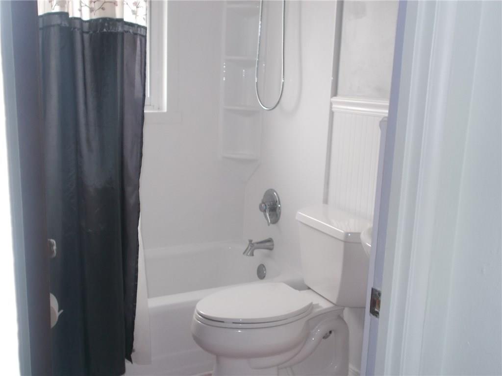 132 Starling Drive McKees Rocks, PA 15136 - Photo 17 of 25 Updated full bathroom on first floor includes newer fixtures and hardware, fiberglass wainscot in shower and on the walls. Pedestal sink