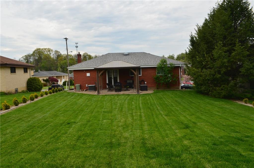 132 Starling Drive McKees Rocks, PA 15136 - Photo 3 of 25 A lawn imagined in your dreams. Easier to maintain and almost perfectly level, spacious back yard, just a great feature!!