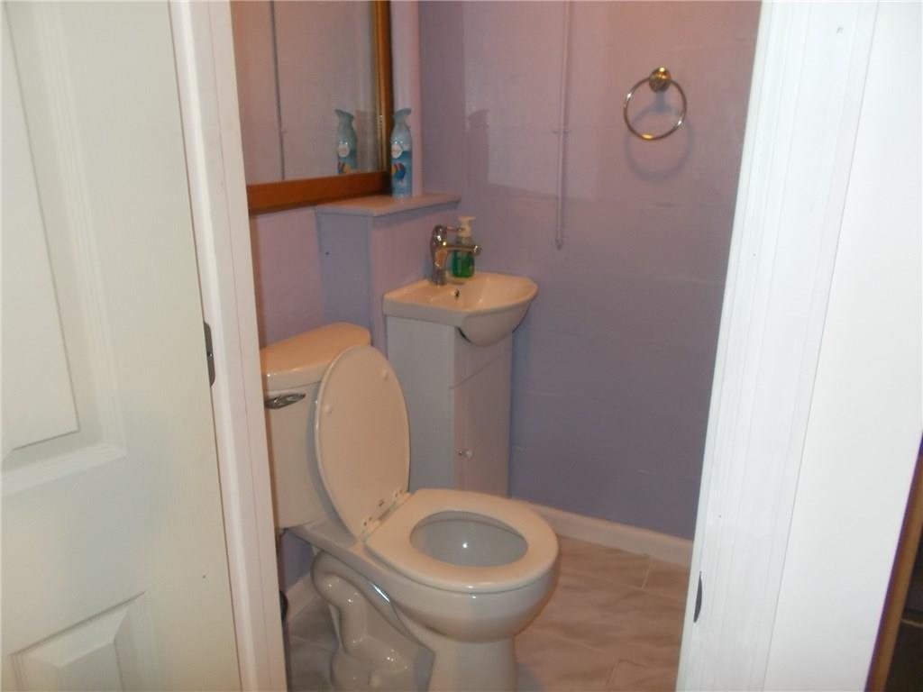 132 Starling Drive McKees Rocks, PA 15136 - Photo 22 of 25 Basement Powder Room - New fixtures and marble/ceramic tile floor