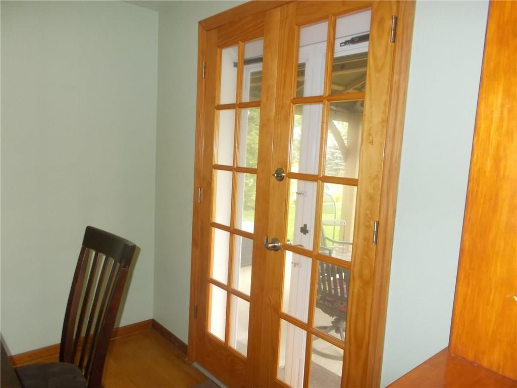 132 Starling Drive McKees Rocks, PA 15136 - Photo 9 of 25 Owner opened up the dining room back wall that used to be a window to an entrance to the back patio.