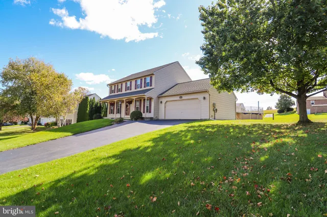 a view of a house with a big yard