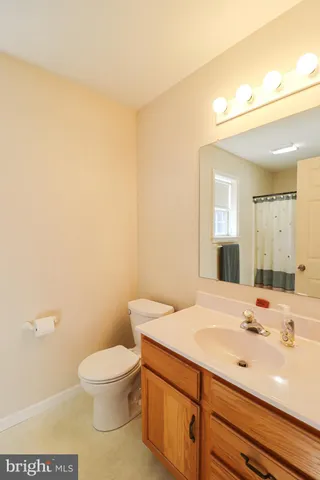 a bathroom with a shower and a tub