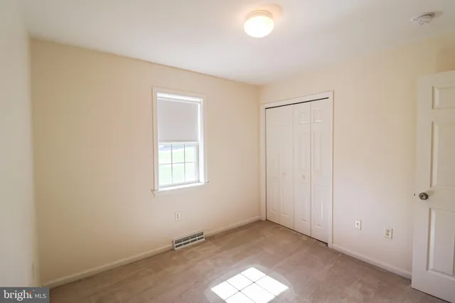 a bathroom with a sink a toilet and tub
