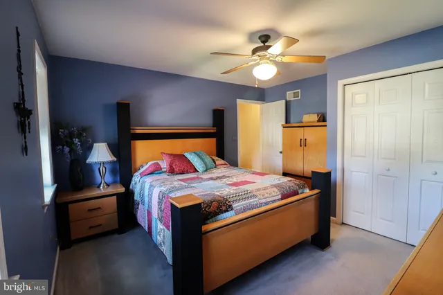 a bathroom with a shower and a bath tub