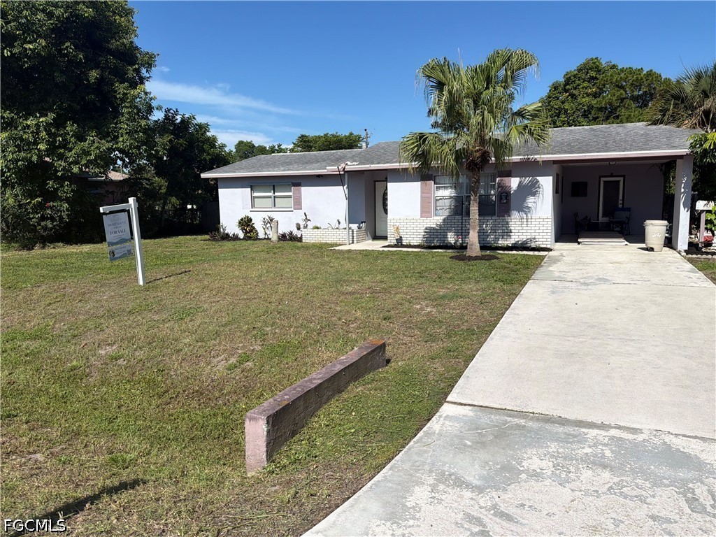 17 Illinois Road Lehigh Acres, FL 33936 - Photo 1 of 31
