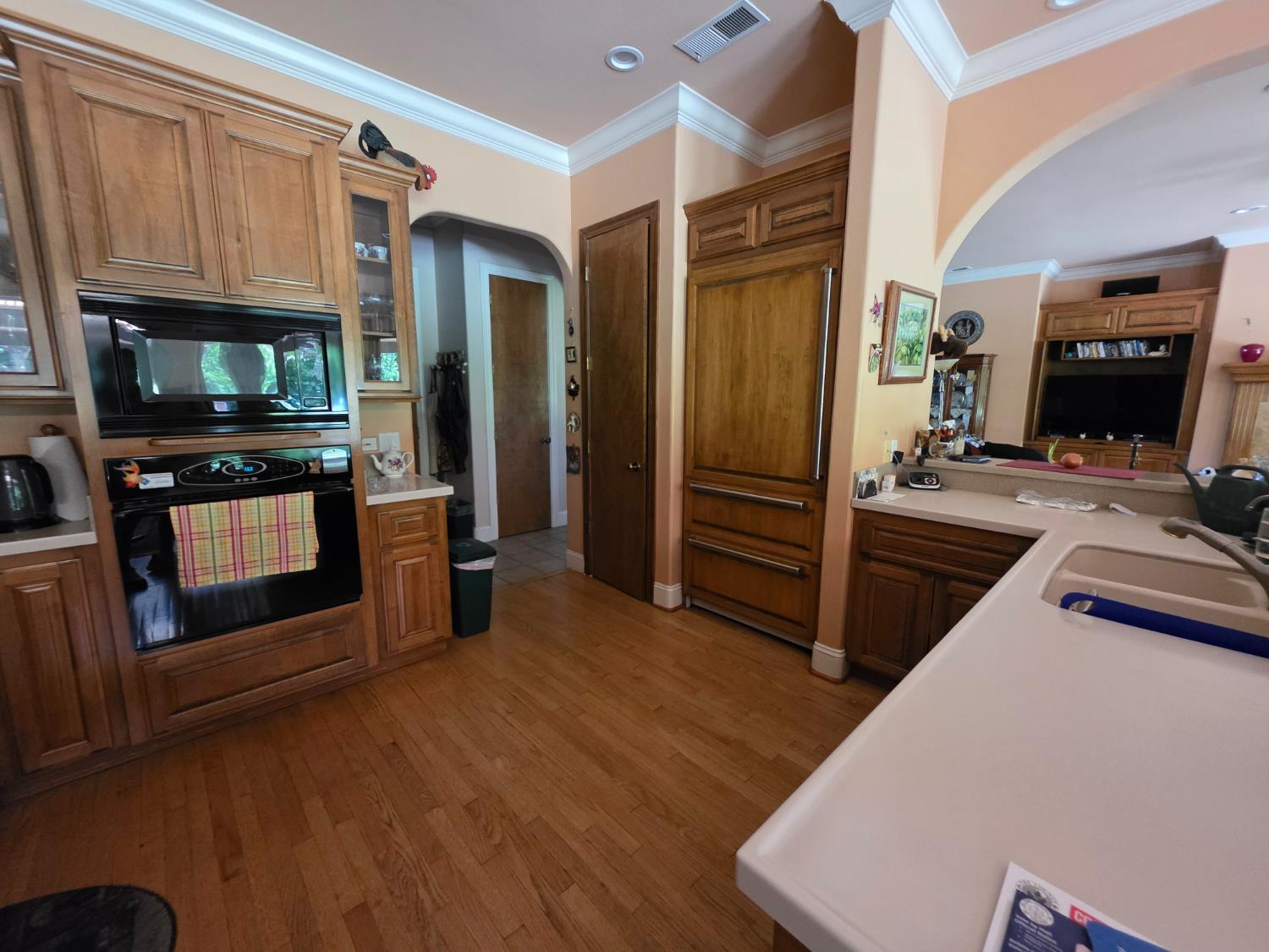 1072 Rorden Avenue Selma, CA 93662 - Photo 13 of 40 a kitchen with granite countertop a refrigerator and a stove top oven