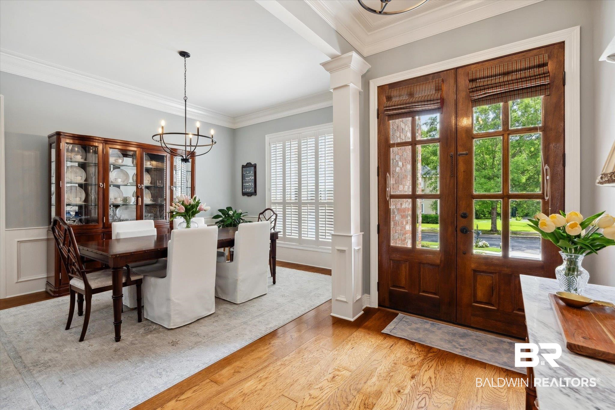 804 Country Club Road Mobile, AL 36609 - Photo 4 of 63 Interior space with light hardwood / wood-style flooring, an inviting chandelier, and a healthy amount of sunlight