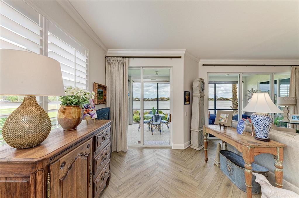 1151 Riverscape Street, Unit 1151 Bradenton, FL 34208 - Photo 26 of 62 a room with furniture and a potted plant