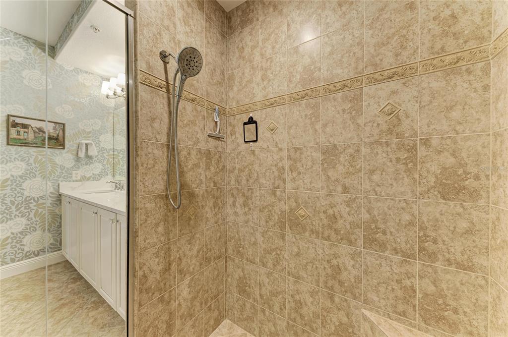 1151 Riverscape Street, Unit 1151 Bradenton, FL 34208 - Photo 33 of 62 a bathroom with a shower
