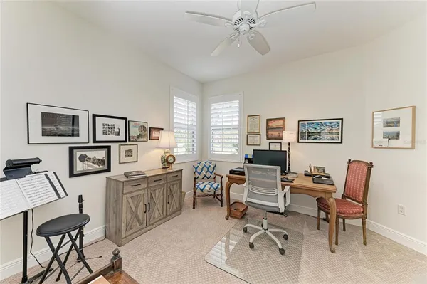 a dining room with furniture window and outside view