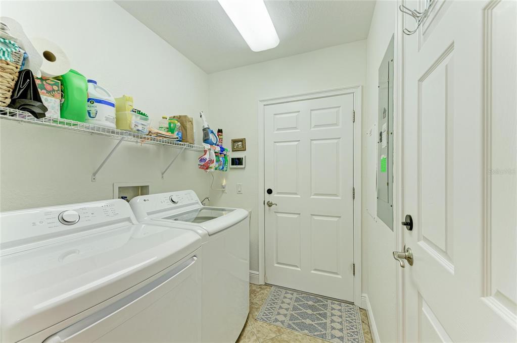 1151 Riverscape Street, Unit 1151 Bradenton, FL 34208 - Photo 39 of 62 a utility room with dryer and washer