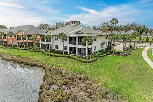 a outdoor living space with furniture and a fireplace
