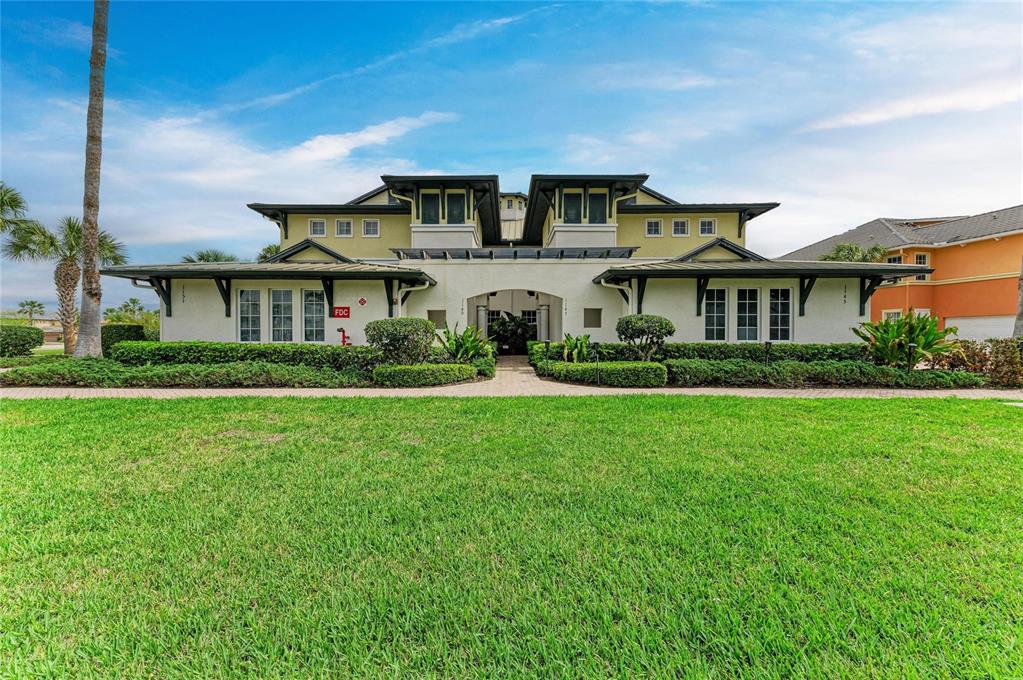 1151 Riverscape Street, Unit 1151 Bradenton, FL 34208 - Photo 50 of 62 a front view of house with yard and green space