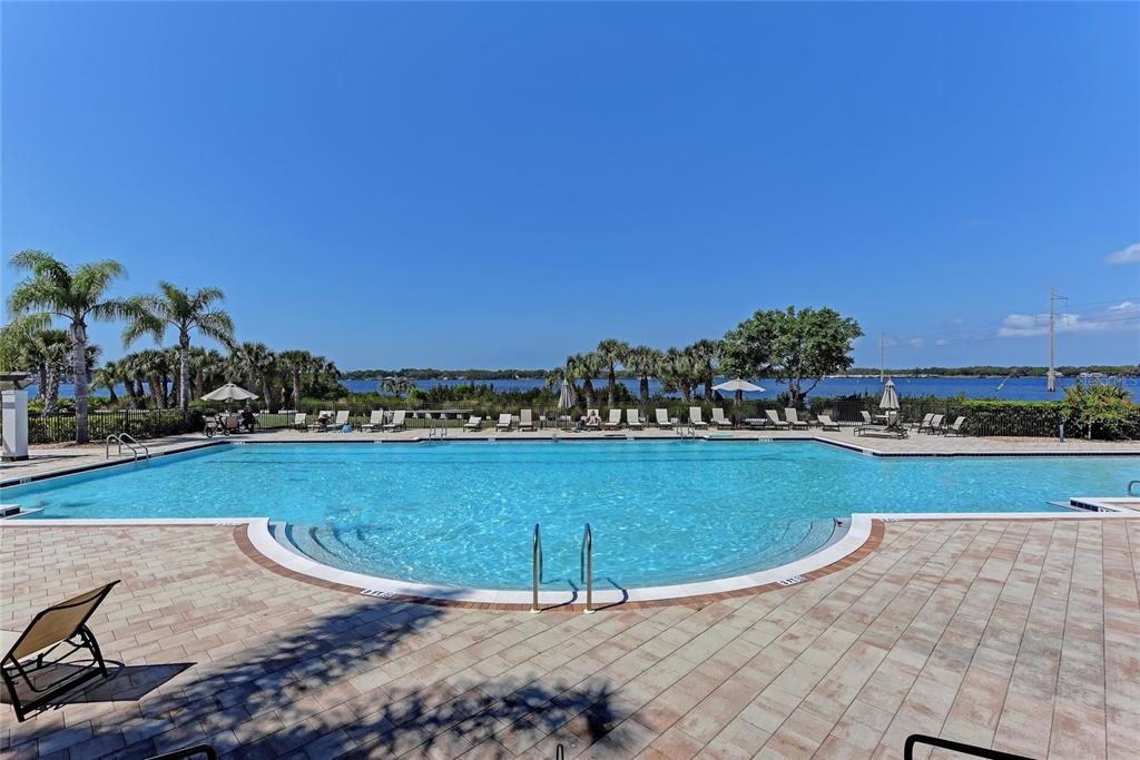 1151 Riverscape Street, Unit 1151 Bradenton, FL 34208 - Photo 56 of 62 a view of a swimming pool and an outdoor space
