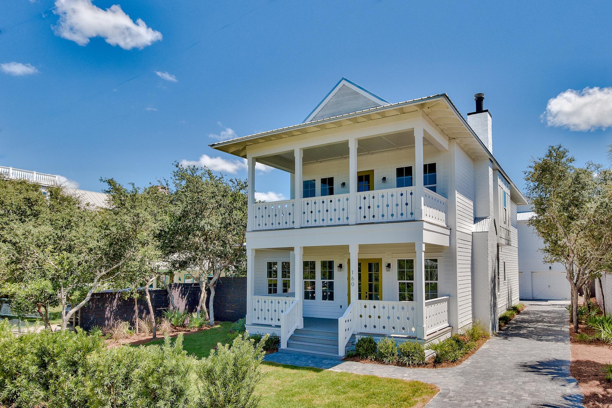 160 A St Inlet Beach Inlet Beach, FL 32461 - Photo 2 of 63 a front view of a house with a yard