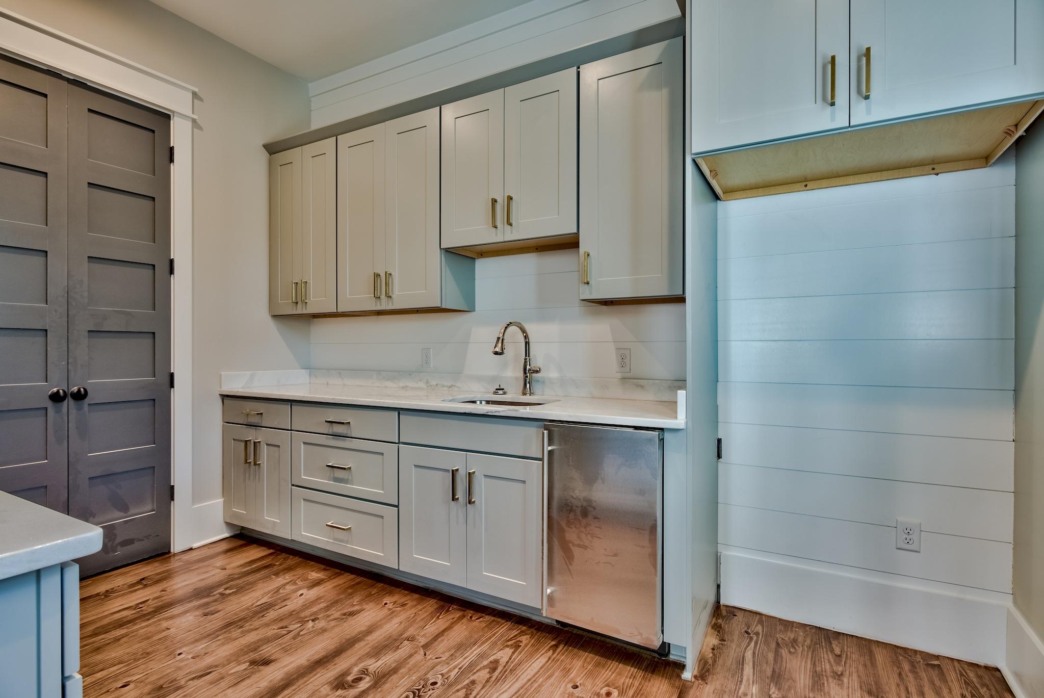 160 A St Inlet Beach Inlet Beach, FL 32461 - Photo 11 of 63 a kitchen with stainless steel appliances granite countertop a sink and cabinets