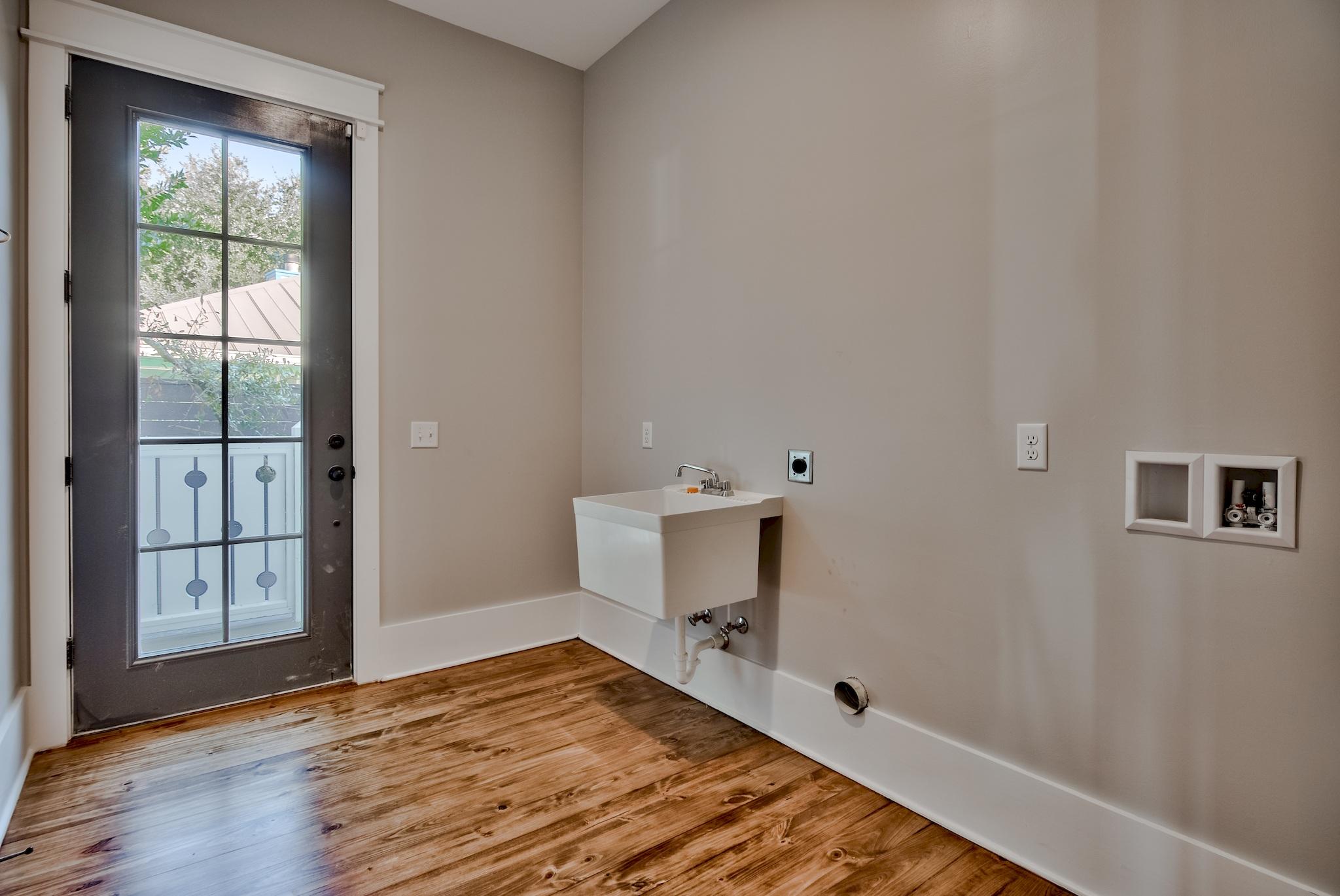 160 A St Inlet Beach Inlet Beach, FL 32461 - Photo 15 of 63 a view of a room with wooden floor and cabinet