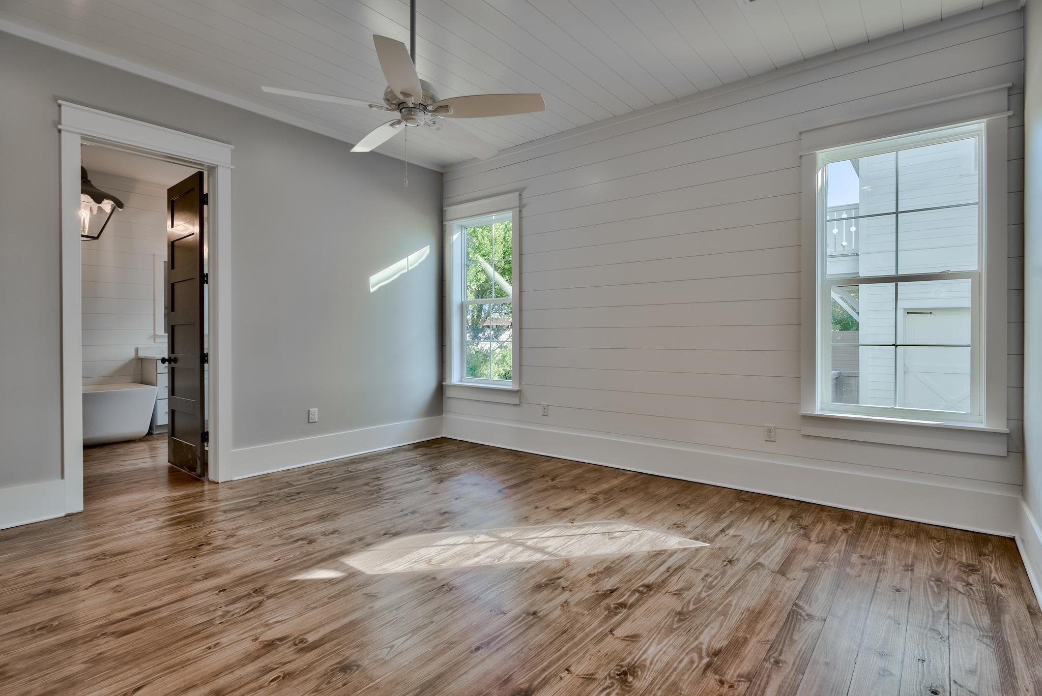 160 A St Inlet Beach Inlet Beach, FL 32461 - Photo 17 of 63 wooden floor in an empty room with a window