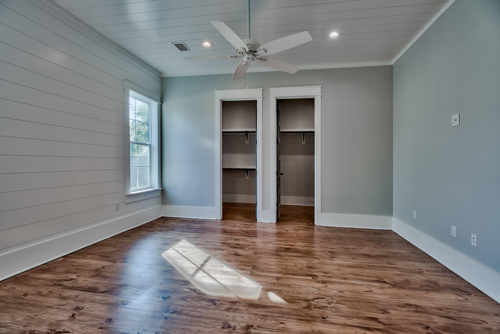 160 A St Inlet Beach Inlet Beach, FL 32461 - Photo 19 of 63 a view of an empty room with a window and wooden floor