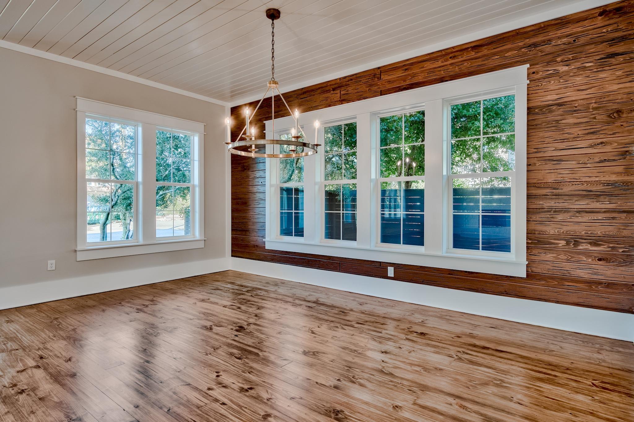 160 A St Inlet Beach Inlet Beach, FL 32461 - Photo 22 of 63 a view of an empty room with a window and wooden floor
