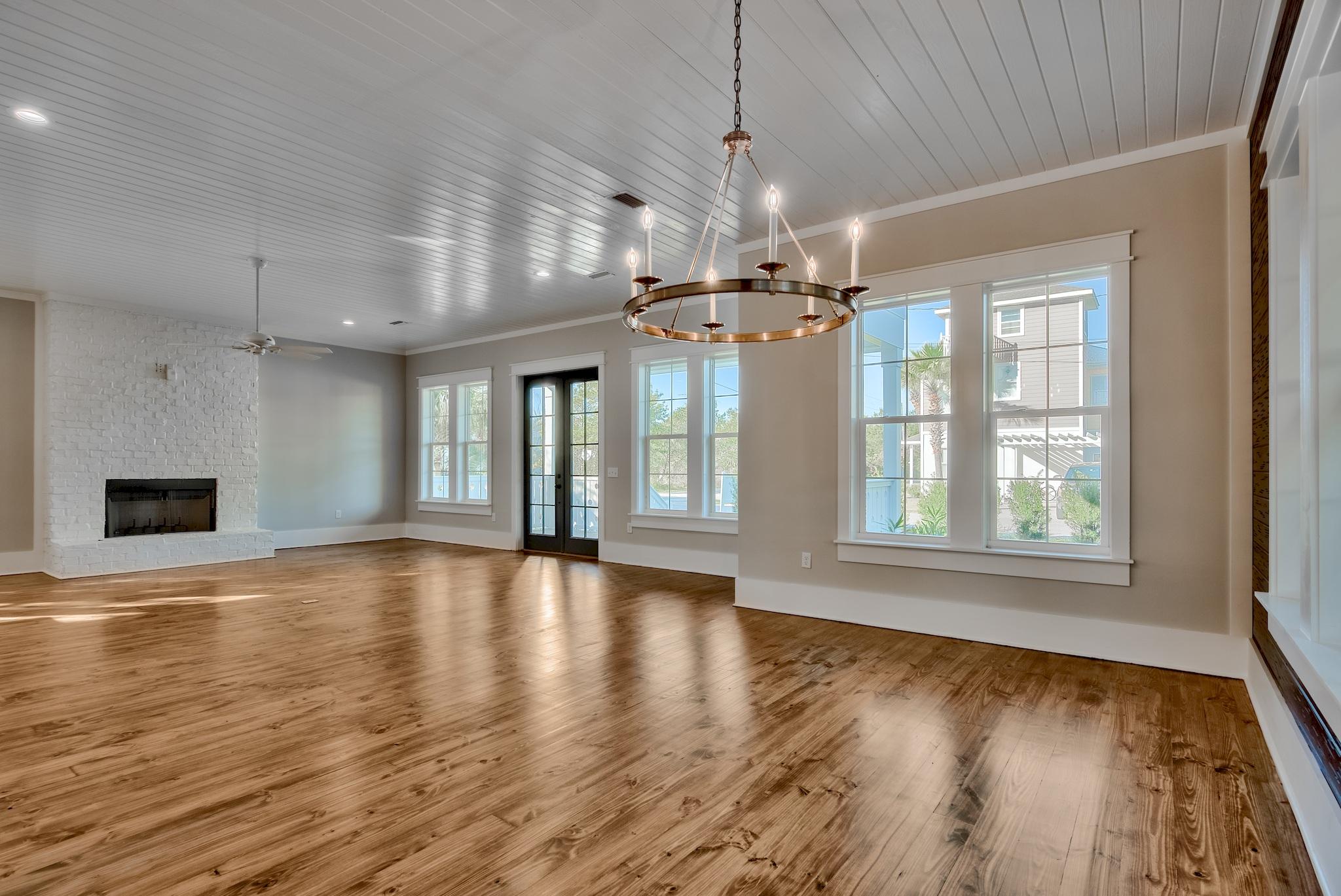 160 A St Inlet Beach Inlet Beach, FL 32461 - Photo 23 of 63 an empty room with wooden floor and windows