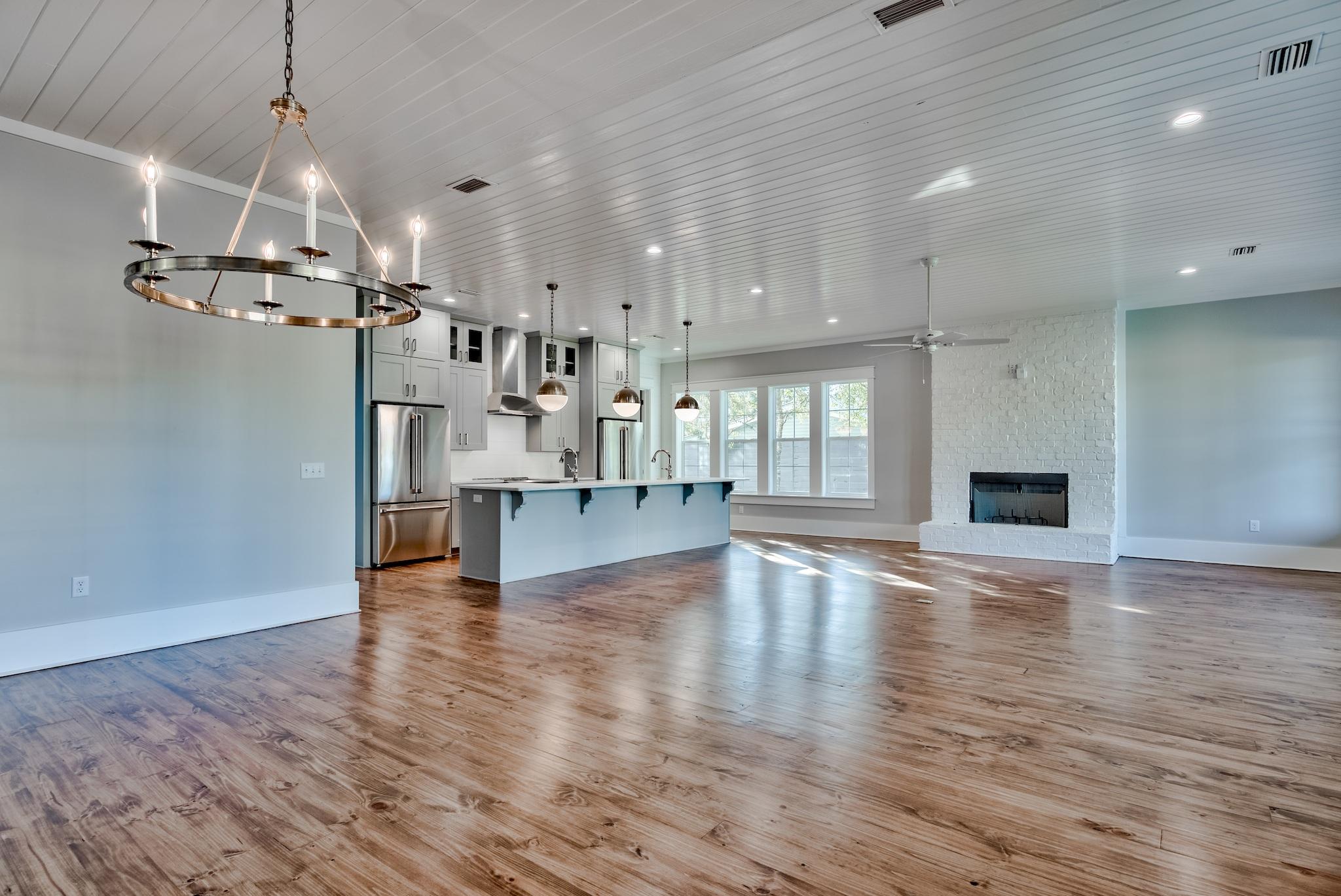 160 A St Inlet Beach Inlet Beach, FL 32461 - Photo 24 of 63 a view of empty room with wooden floor and fireplace