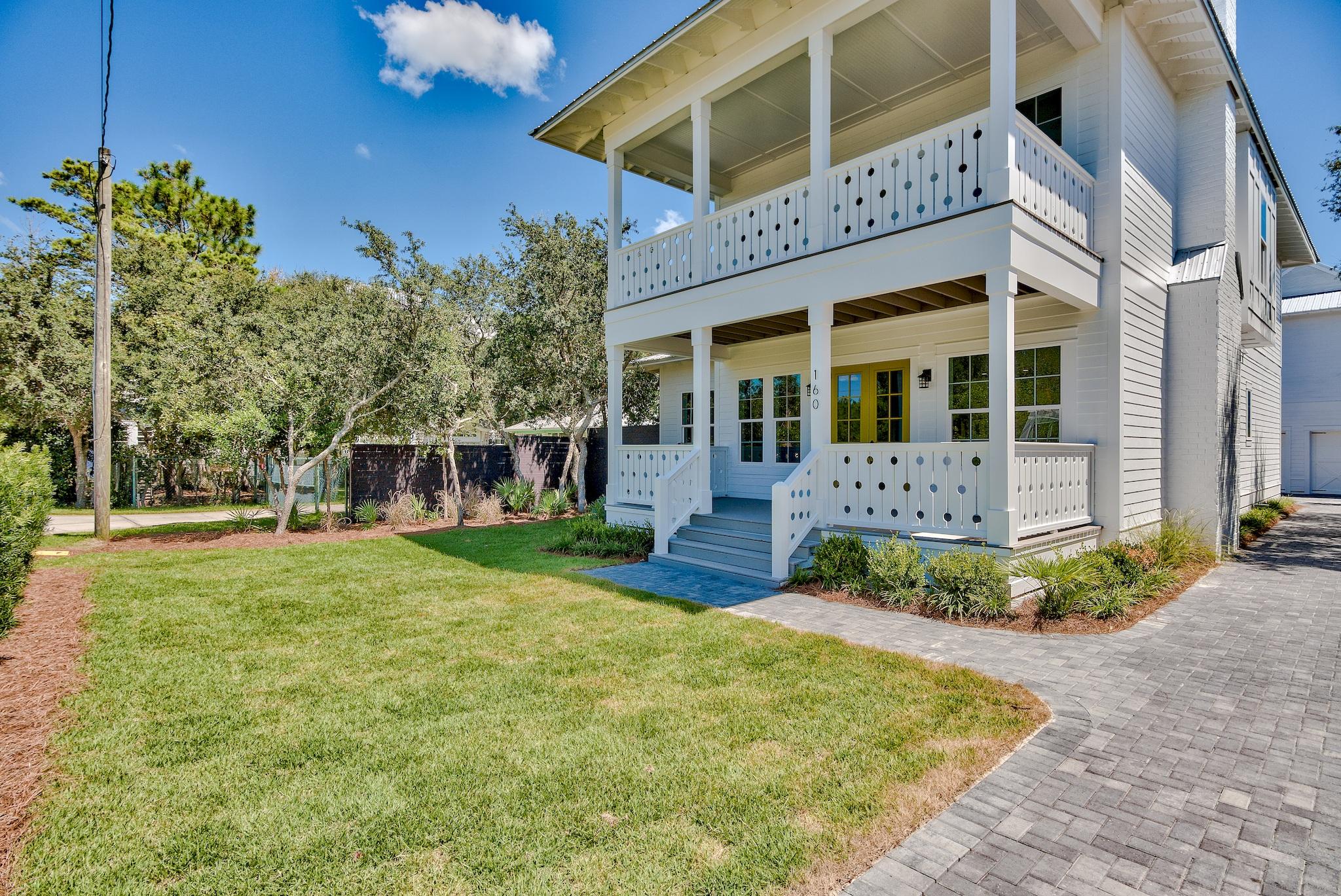 160 A St Inlet Beach Inlet Beach, FL 32461 - Photo 4 of 63 front view of a house with a yard