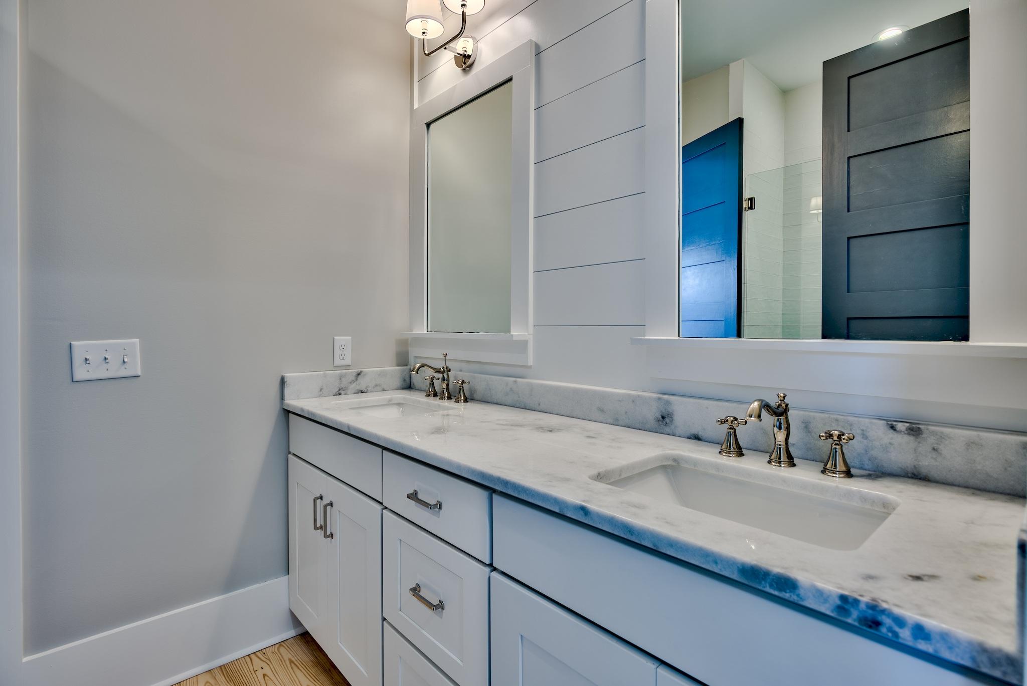 160 A St Inlet Beach Inlet Beach, FL 32461 - Photo 45 of 63 a bathroom with a granite countertop sink and a mirror