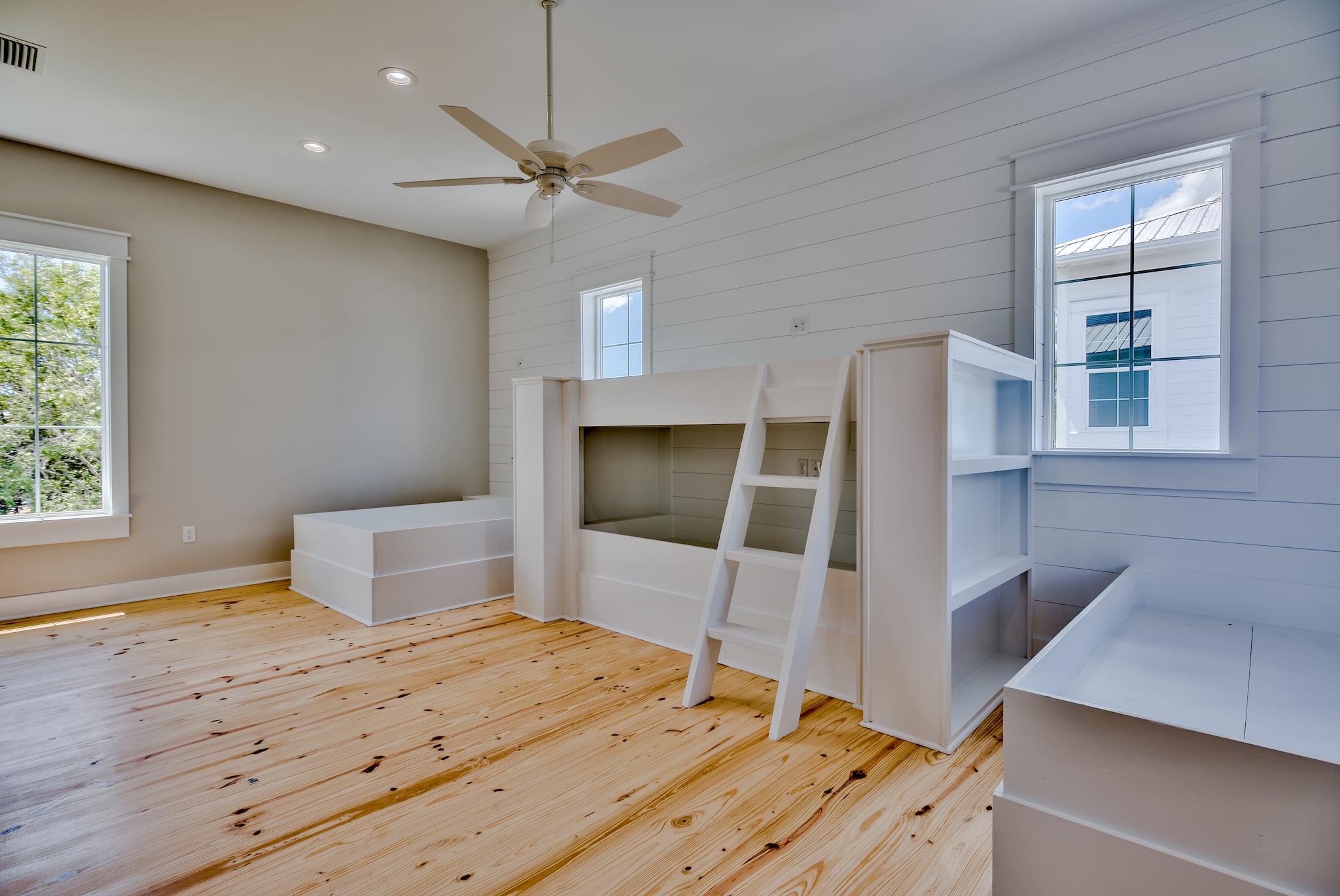 160 A St Inlet Beach Inlet Beach, FL 32461 - Photo 54 of 63 a bedroom with a bed and a flat screen tv