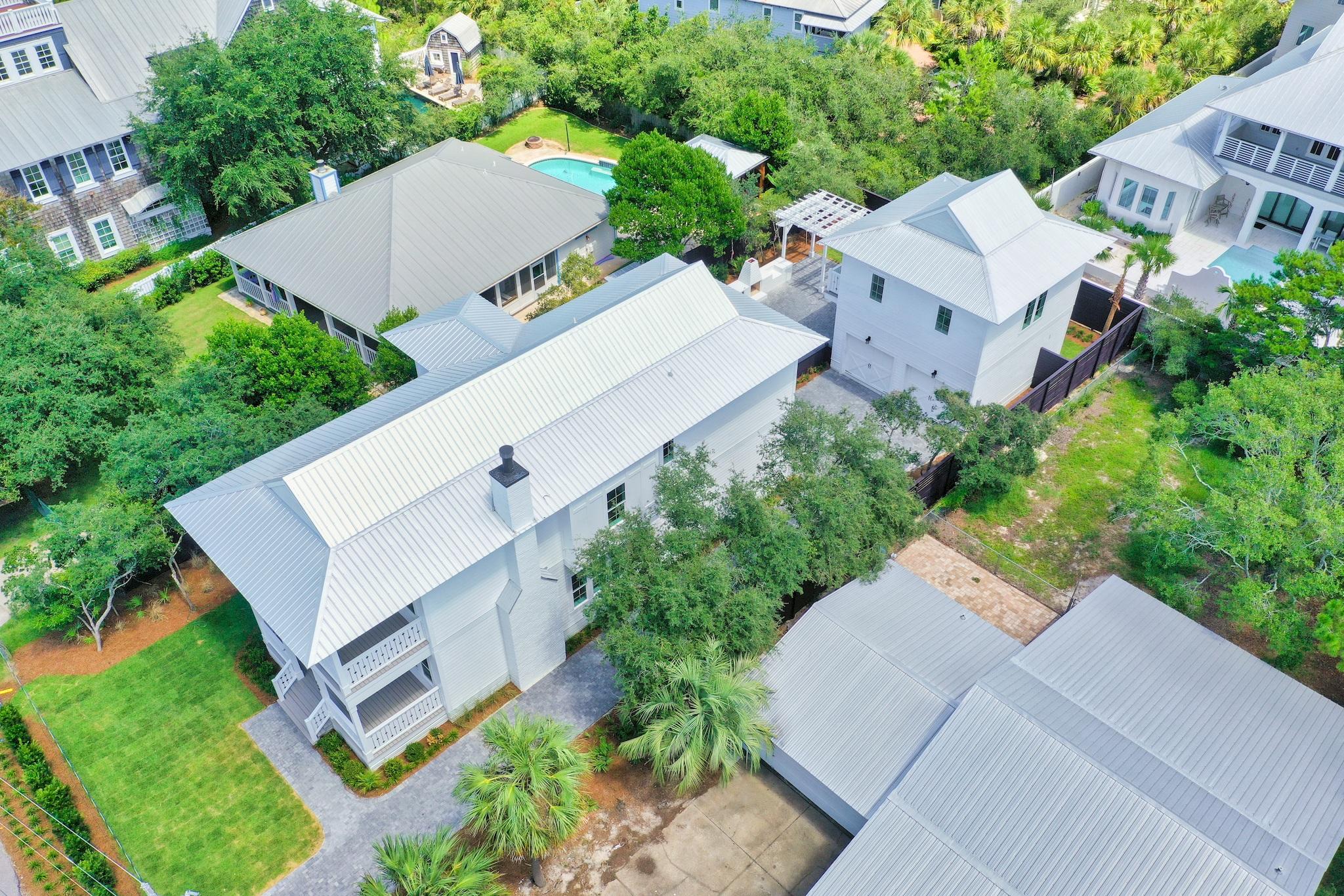 160 A St Inlet Beach Inlet Beach, FL 32461 - Photo 58 of 63 an aerial view of a house with a yard and trees
