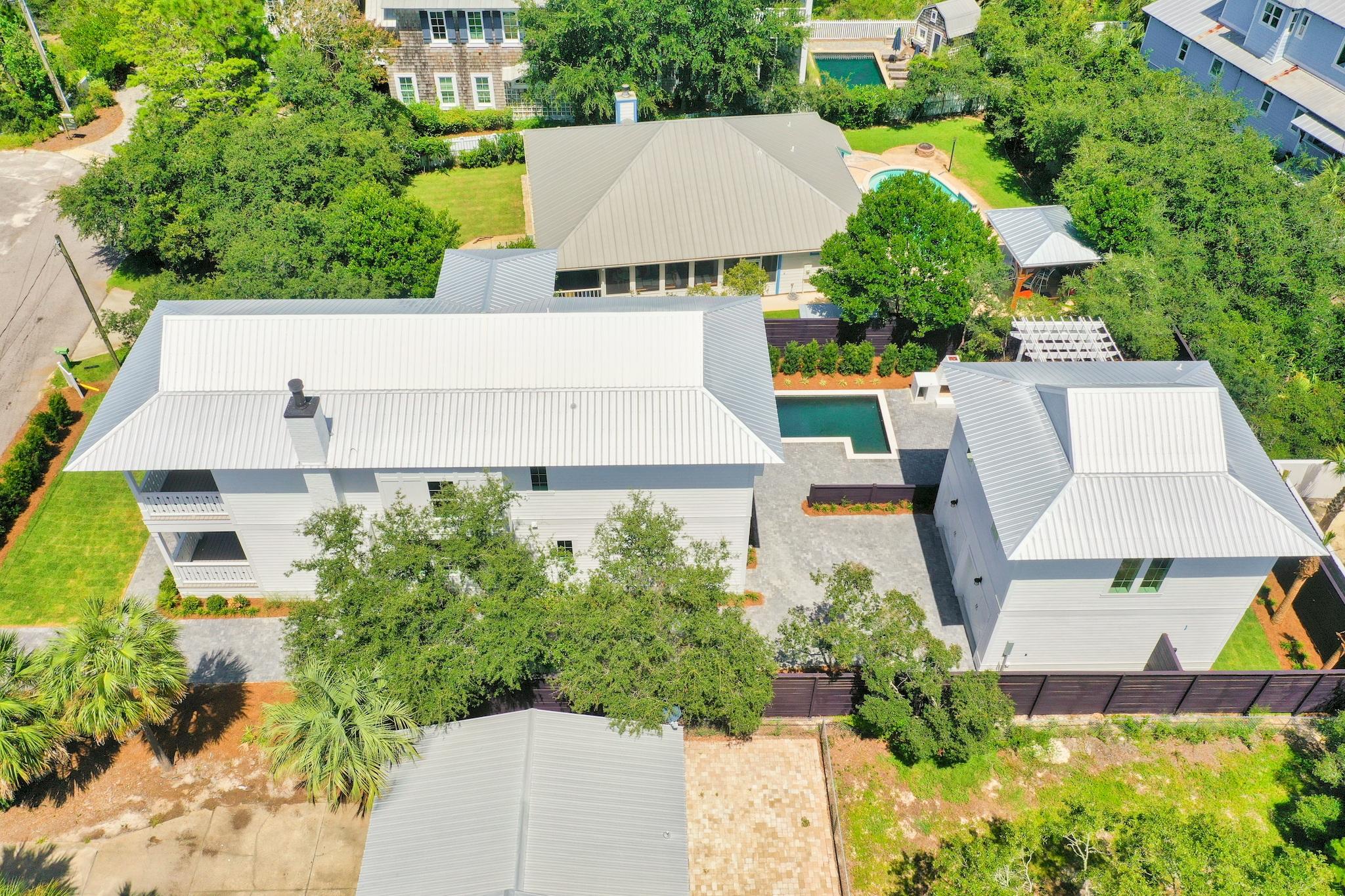 160 A St Inlet Beach Inlet Beach, FL 32461 - Photo 59 of 63 an aerial view of a house with swimming pool and garden