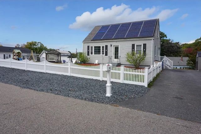 a front view of a house with a porch