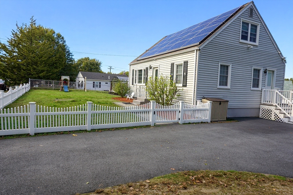 4 Jean Street Blackstone, MA 01504 - Photo 3 of 31 a view of a house with a backyard and fence
