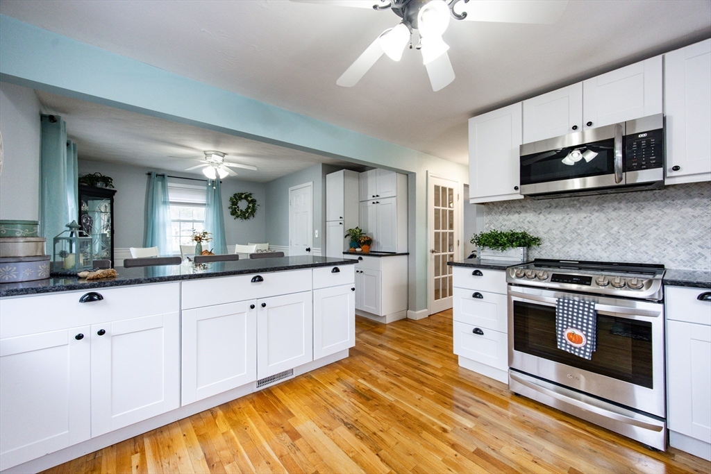 4 Jean Street Blackstone, MA 01504 - Photo 6 of 31 a large kitchen with cabinets a sink and a stove