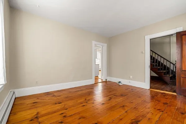 a view of an empty room and window