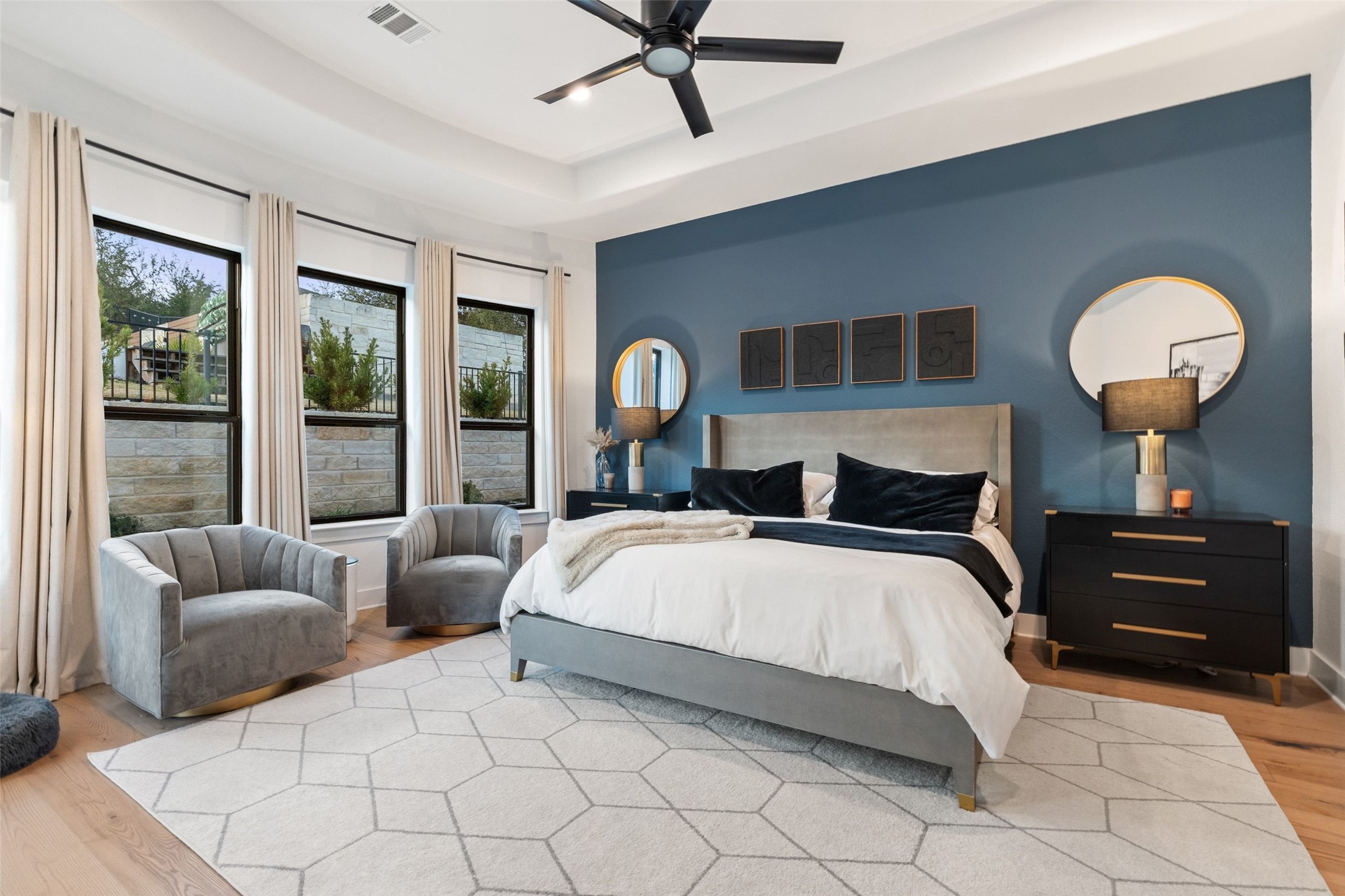302 Lodestone Lane Austin, TX 78738 - Photo 14 of 40 a bedroom with bed and a large window