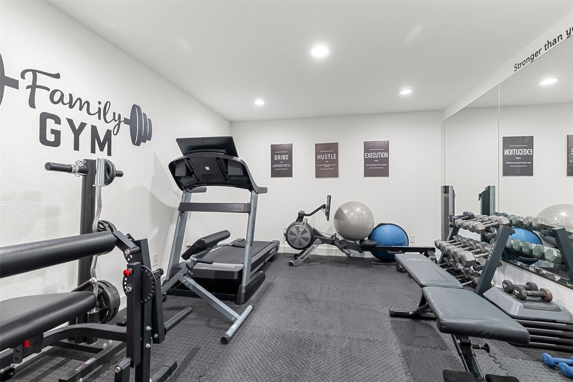 302 Lodestone Lane Austin, TX 78738 - Photo 24 of 40 a room with gym equipment and a table