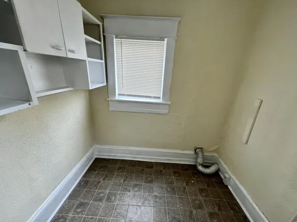 a kitchen with stainless steel appliances granite countertop a refrigerator sink and stove