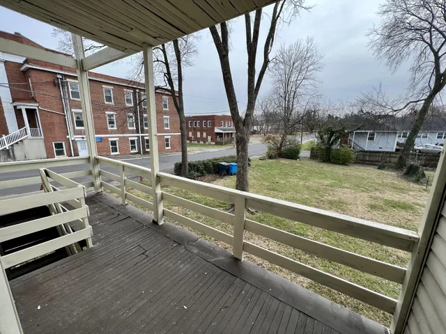 a bathroom with a sink toilet and mirror