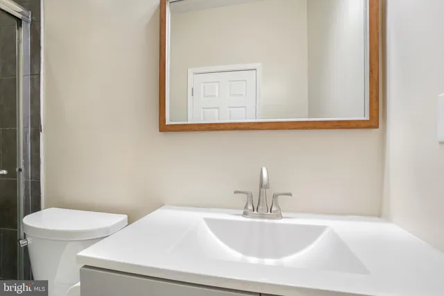 a bathroom with a sink and a toilet