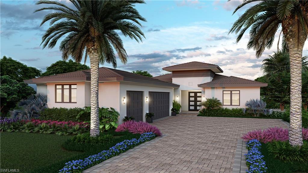 a front view of house with yard and green space