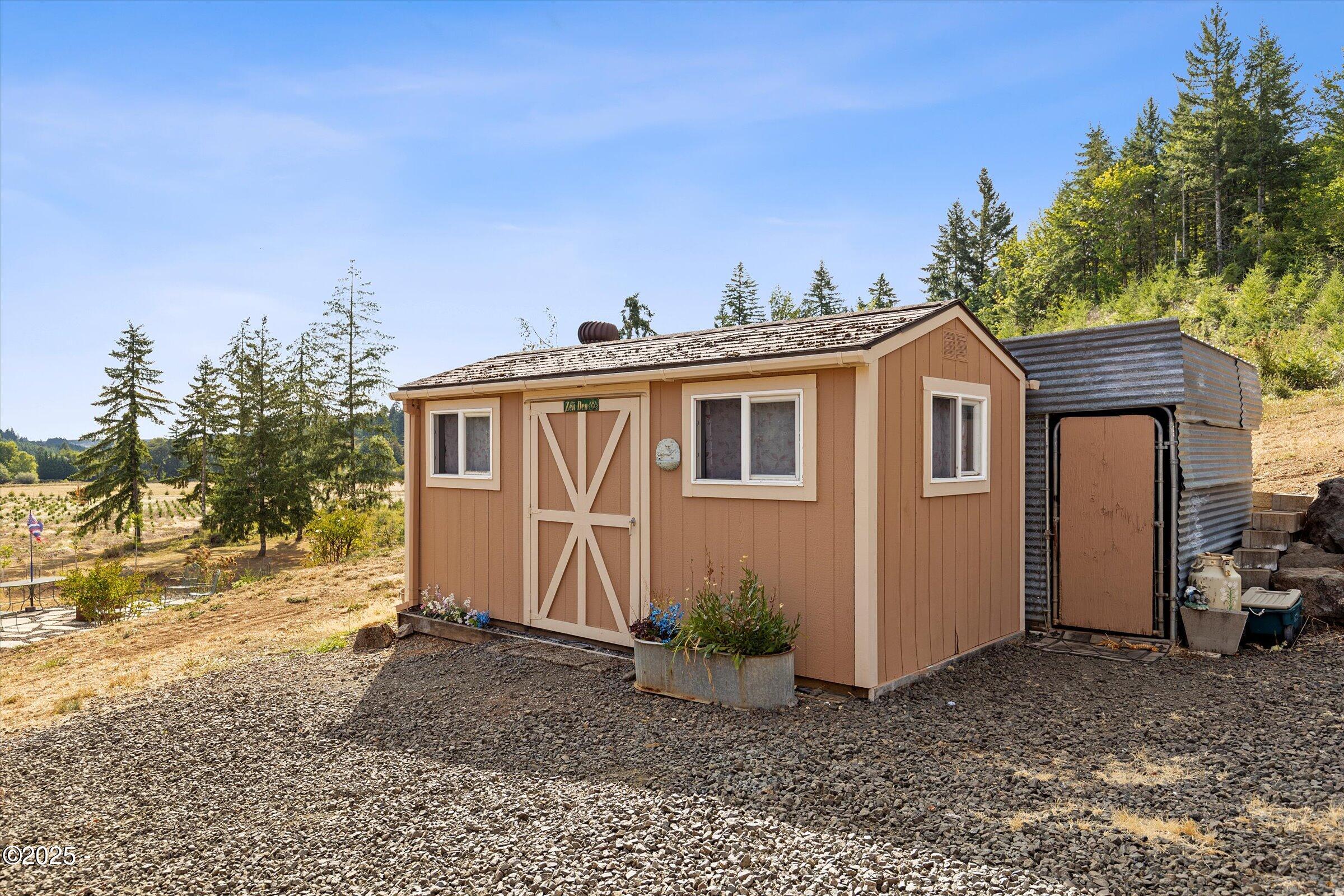21560 Gooseneck Road Sheridan, OR 97378 - Photo 51 of 63 a view of a house with a backyard