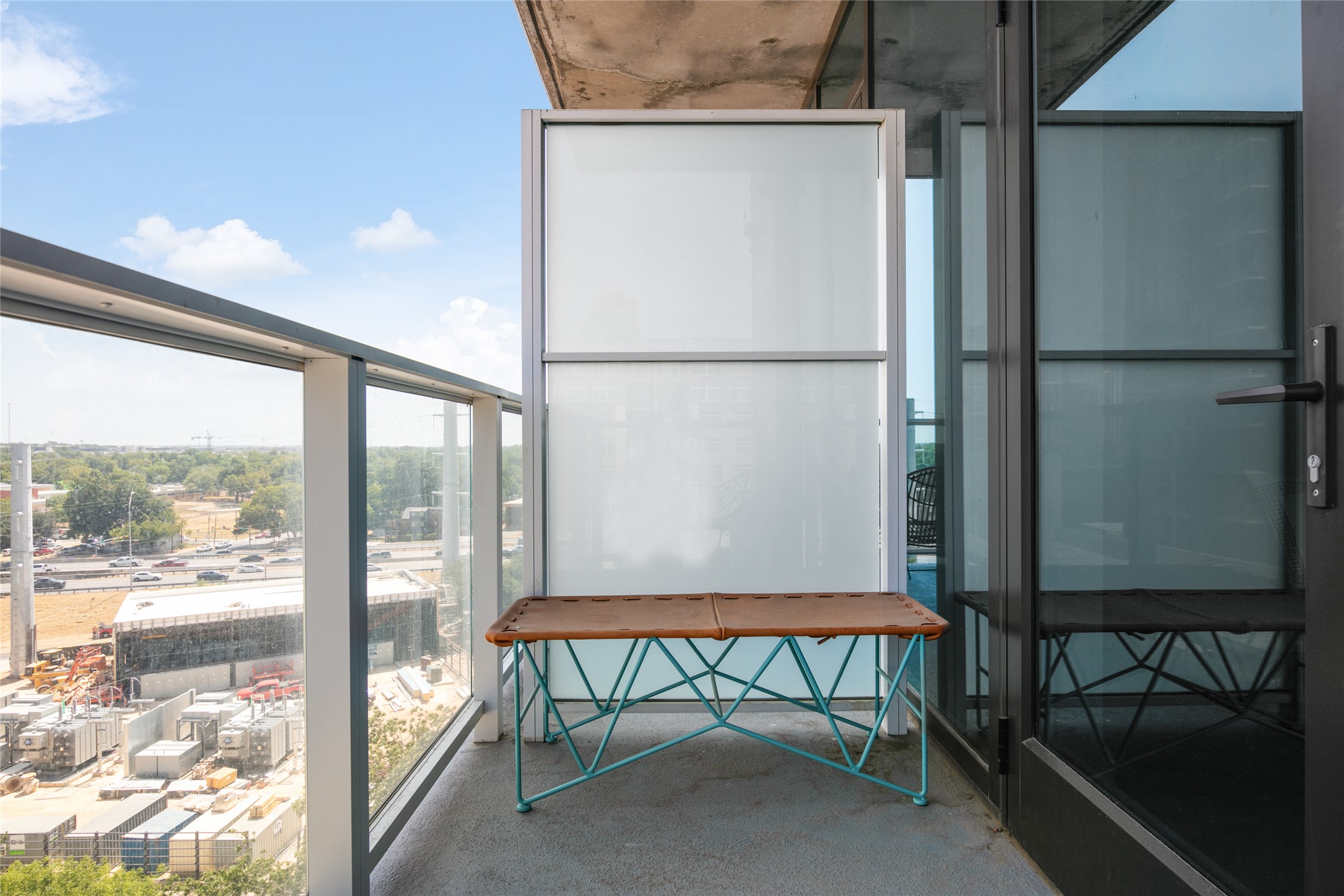 48 East Avenue, Unit 1102 Austin, TX 78701 - Photo 13 of 13 a room with furniture and a window