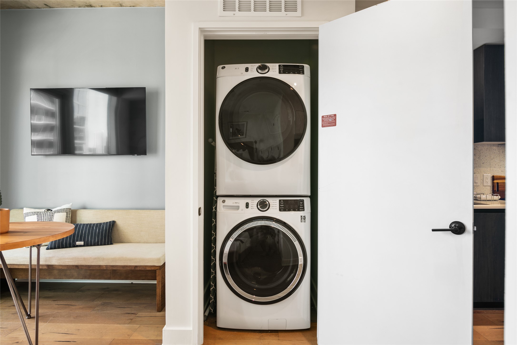 48 East Avenue, Unit 1102 Austin, TX 78701 - Photo 9 of 13 a view of livingroom with washer and dryer