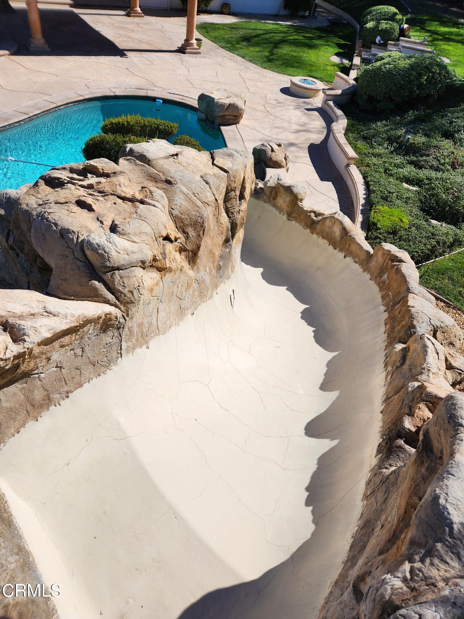 1915 Maya Pradera Lane Moorpark, CA 93021 - Photo 11 of 39 a view of swimming pool with a yard